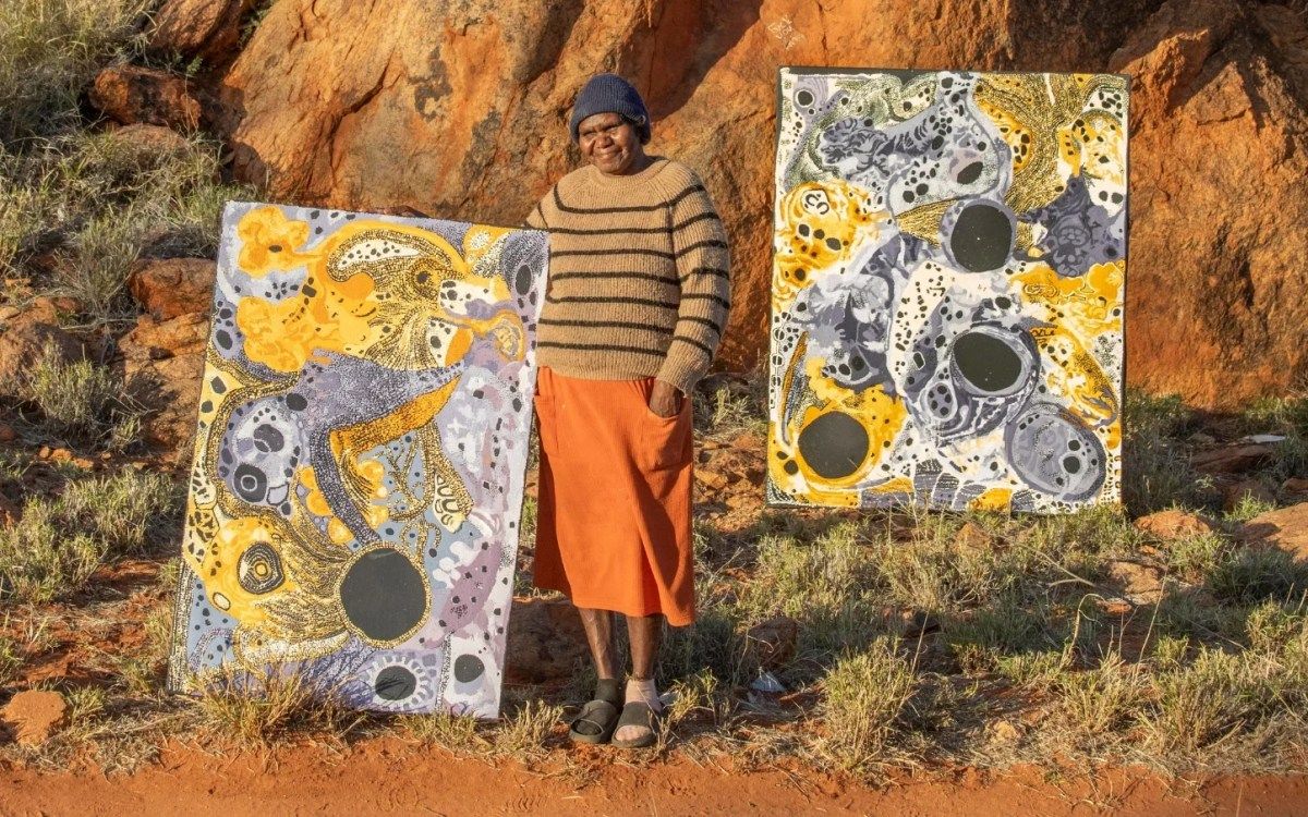 Inside an Aboriginal art centre with artists working