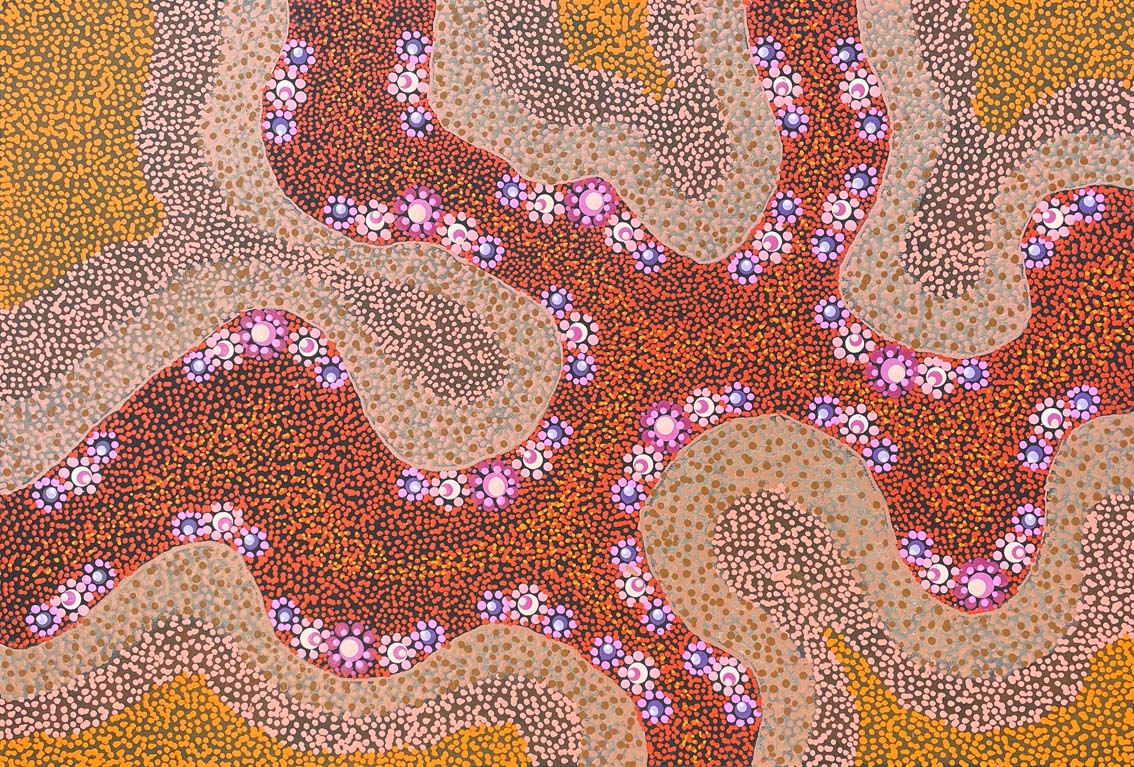 Aboriginal artist painting in traditional style