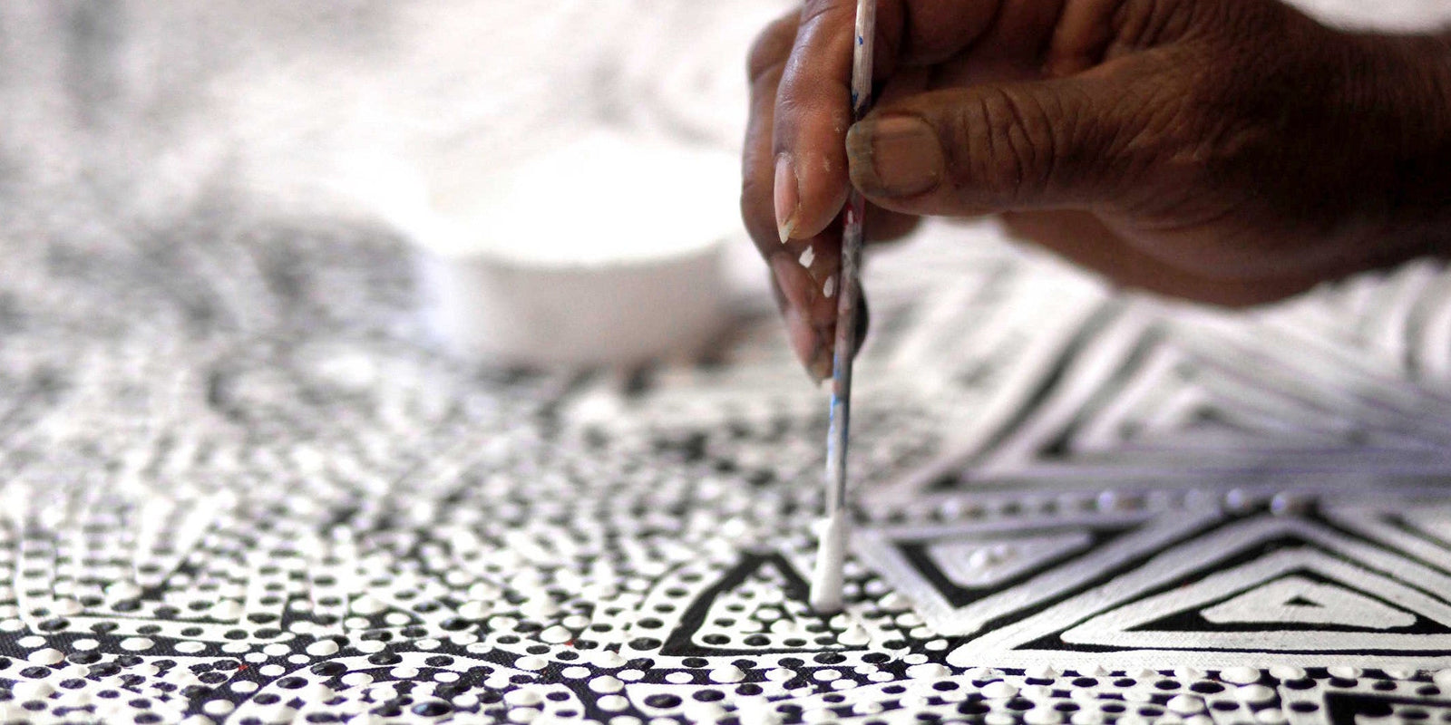 Aboriginal dot painting artworks in Central and Western Desert style