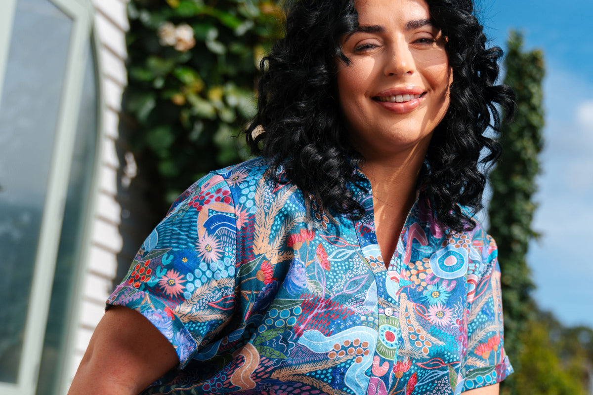 Range of Aboriginal art clothing in blue tones
