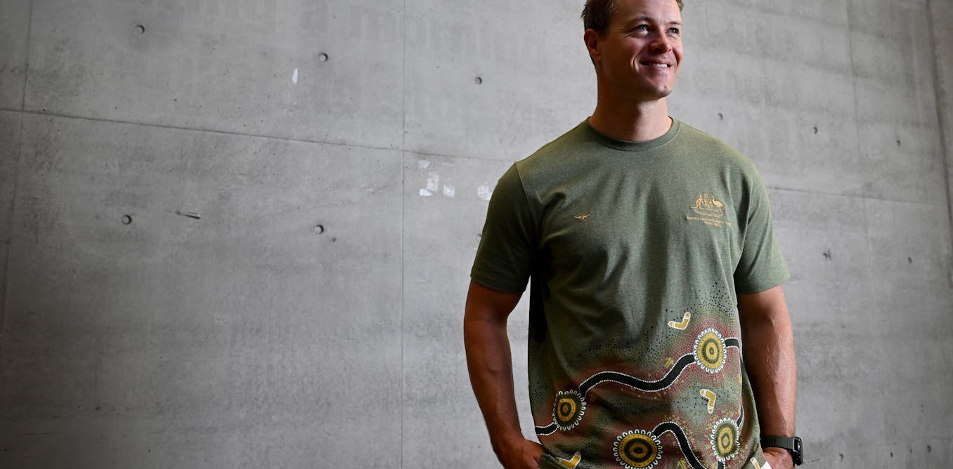 Non-Indigenous person wearing First Nations fashion