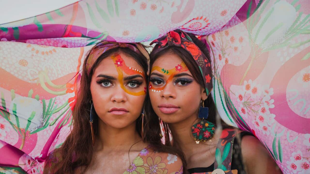 Two First Nations designers showing wearable Aboriginal art