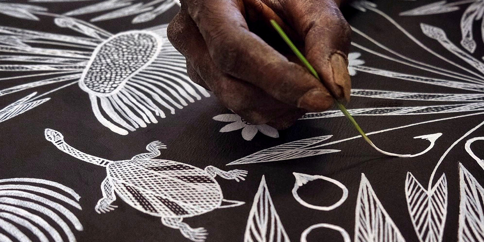 Aboriginal artist working at Gapuwiyak Art Centre in Arnhem Land