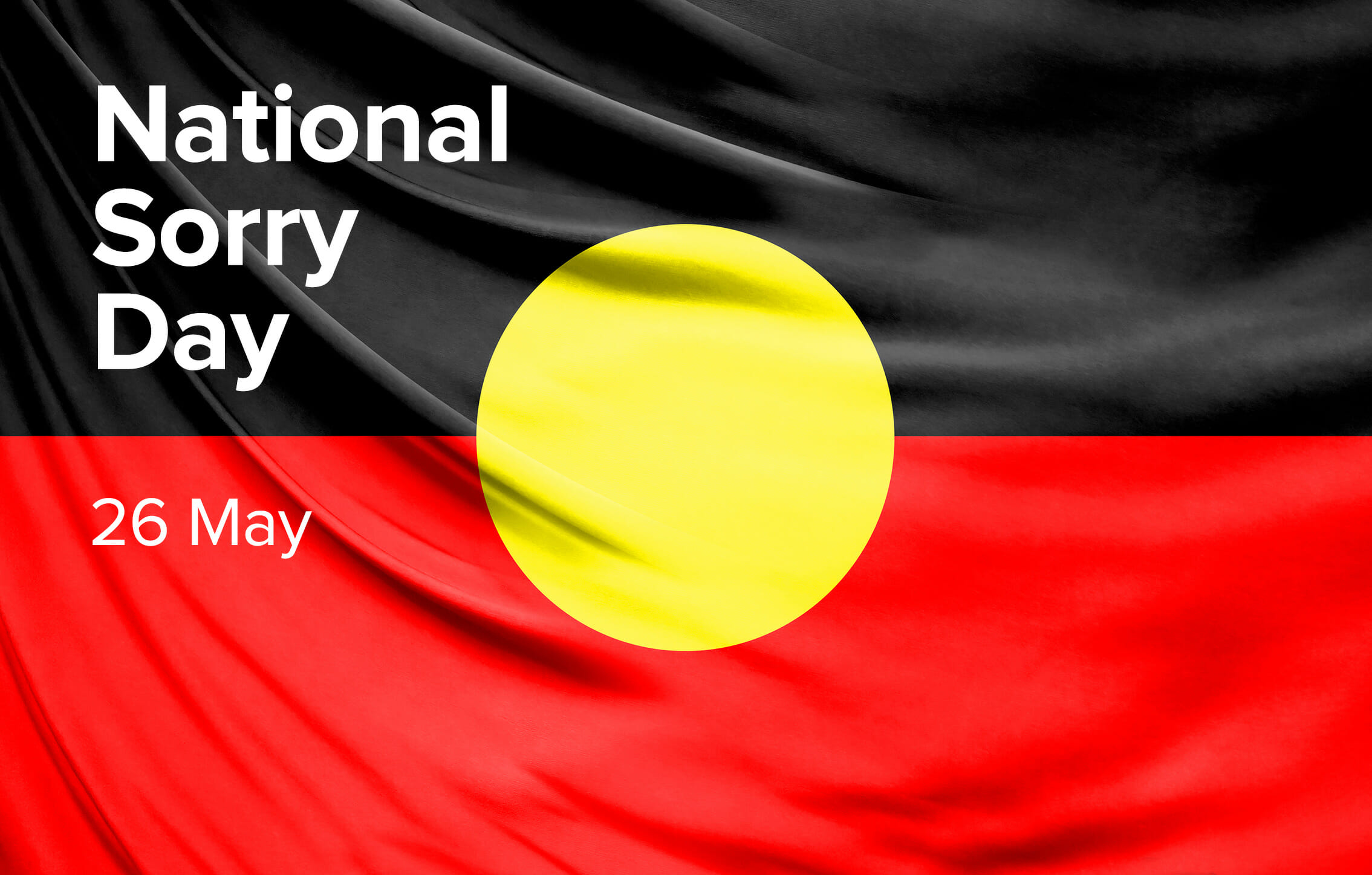 Aboriginal community members at a National Sorry Day commemoration