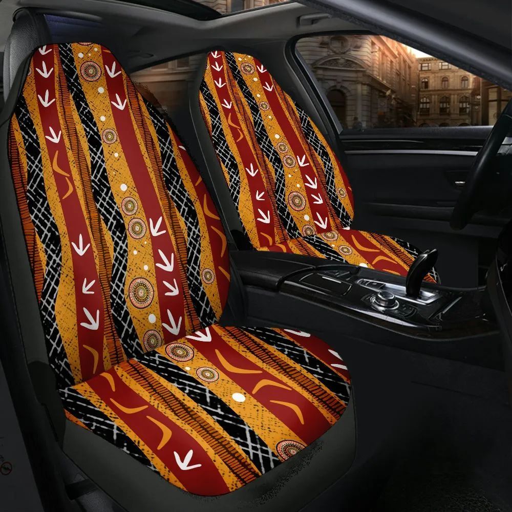 Aboriginal art car seat covers in ochre, red and black fitted to front seats