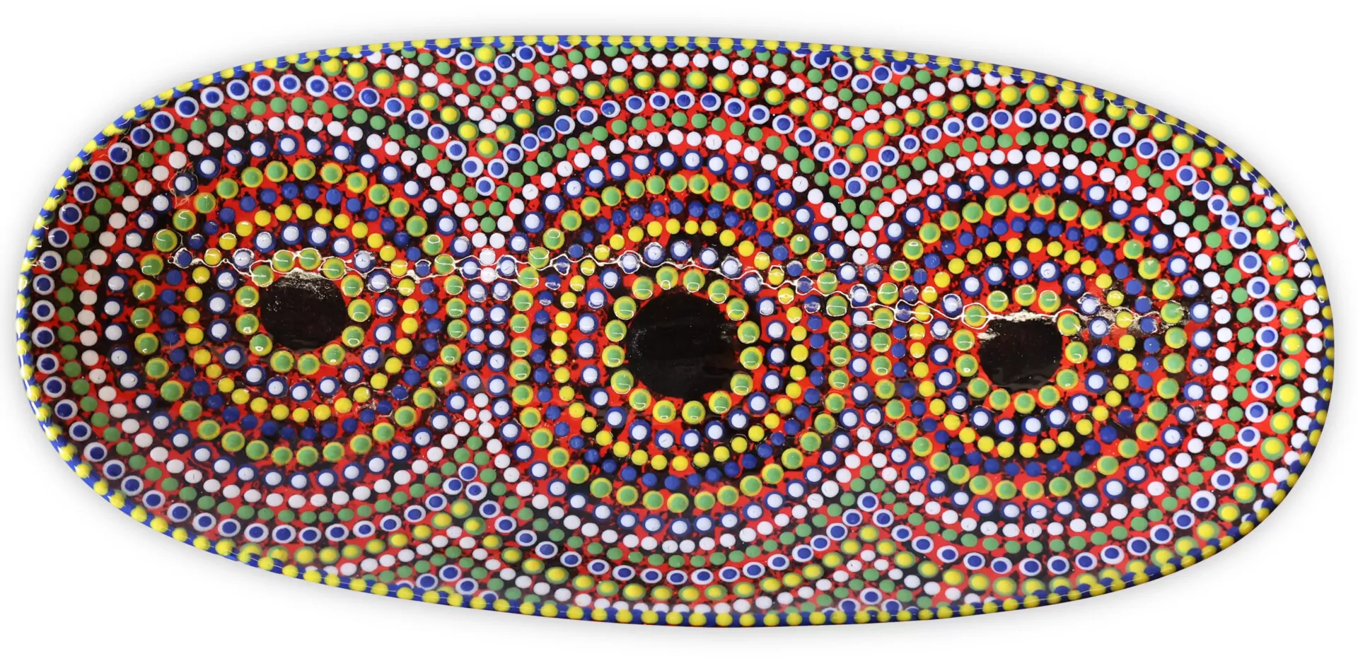 Close-up of an Aboriginal dot painting in earthy ochre tones